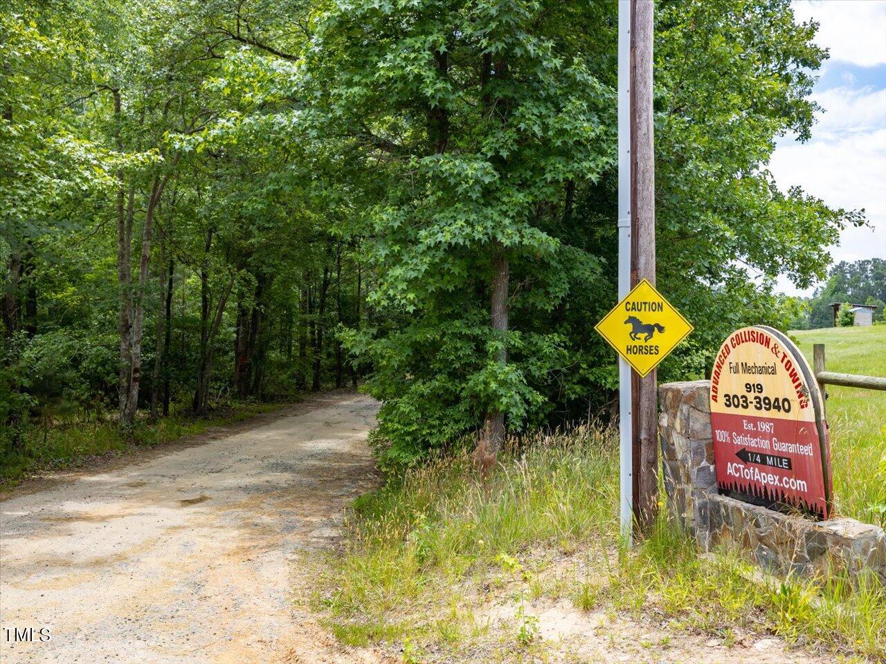 0 J B Morgan Road Apex, NC 27523 - Photo 39 of 39 a sign that is sitting on a brick wall