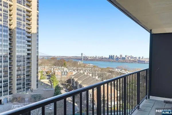 a view of a balcony with city view
