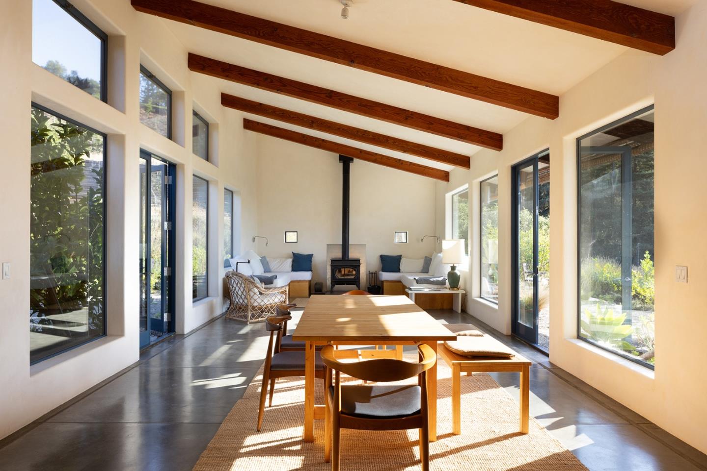 47320 Highway 1 Big Sur, CA 93920 - Photo 44 of 73 a view of a dining room with furniture and wooden floor