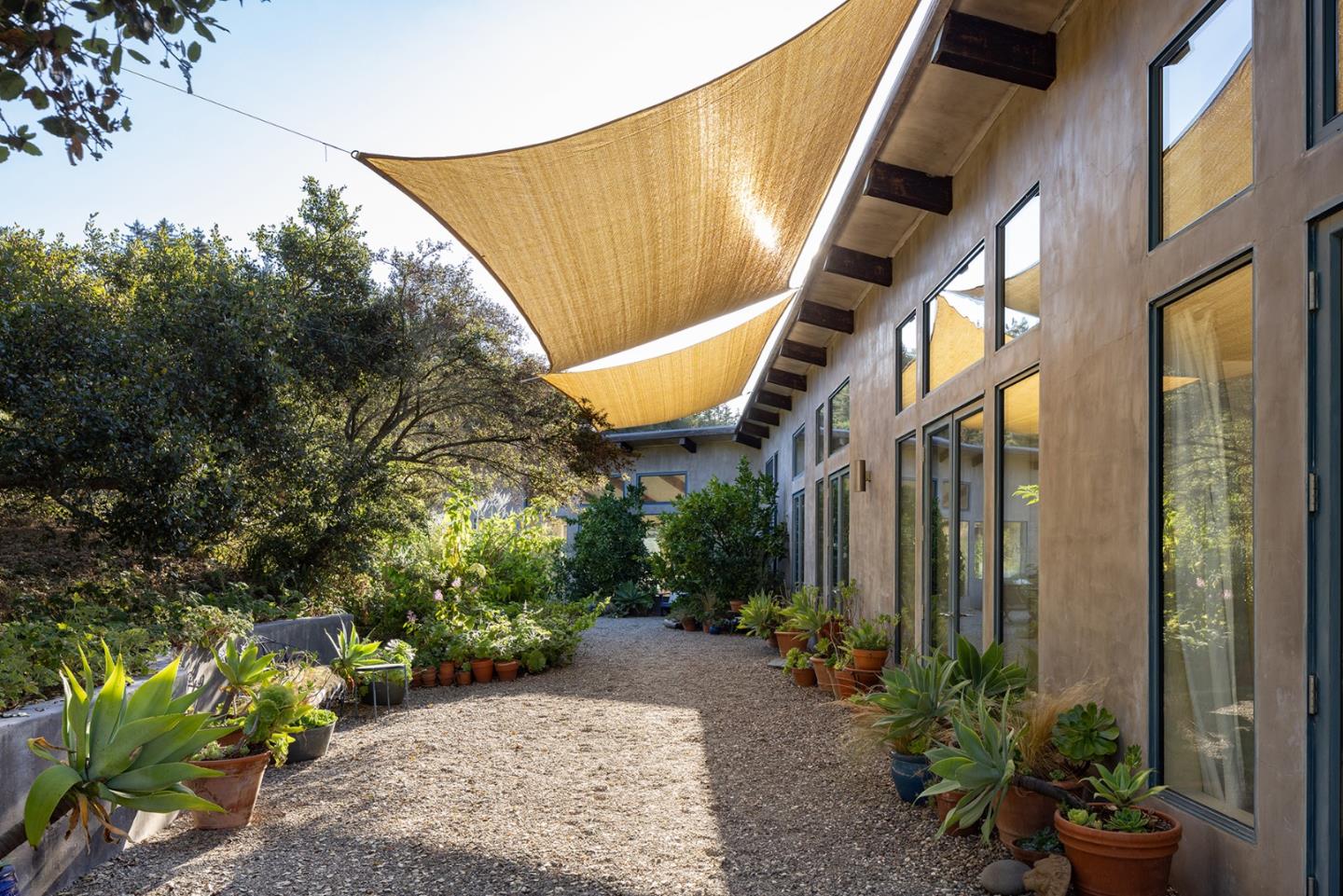 47320 Highway 1 Big Sur, CA 93920 - Photo 55 of 73 a backyard of a house with lots of green space
