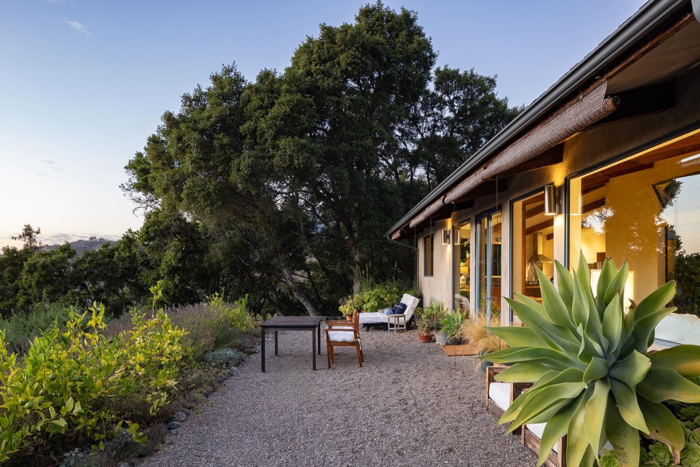 47320 Highway 1 Big Sur, CA 93920 - Photo 58 of 73 a view of a two chair in the patio next to a yard