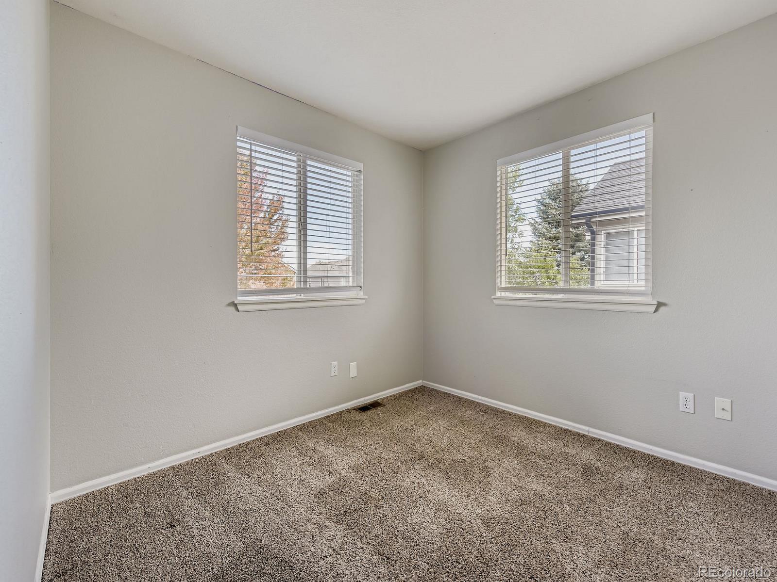 2266 West Ashwood Place Highlands Ranch, CO 80129 - Photo 27 of 48 a view of an empty room with a window