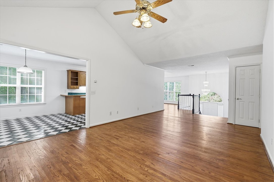1052 Madden Bridge Road Central, SC 29630 - Photo 20 of 50 Vaulted ceilings and warm hardwood floors create an inviting and open main living space.