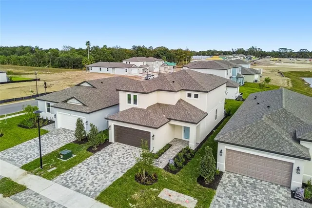 a aerial view of a house with a garden and plants