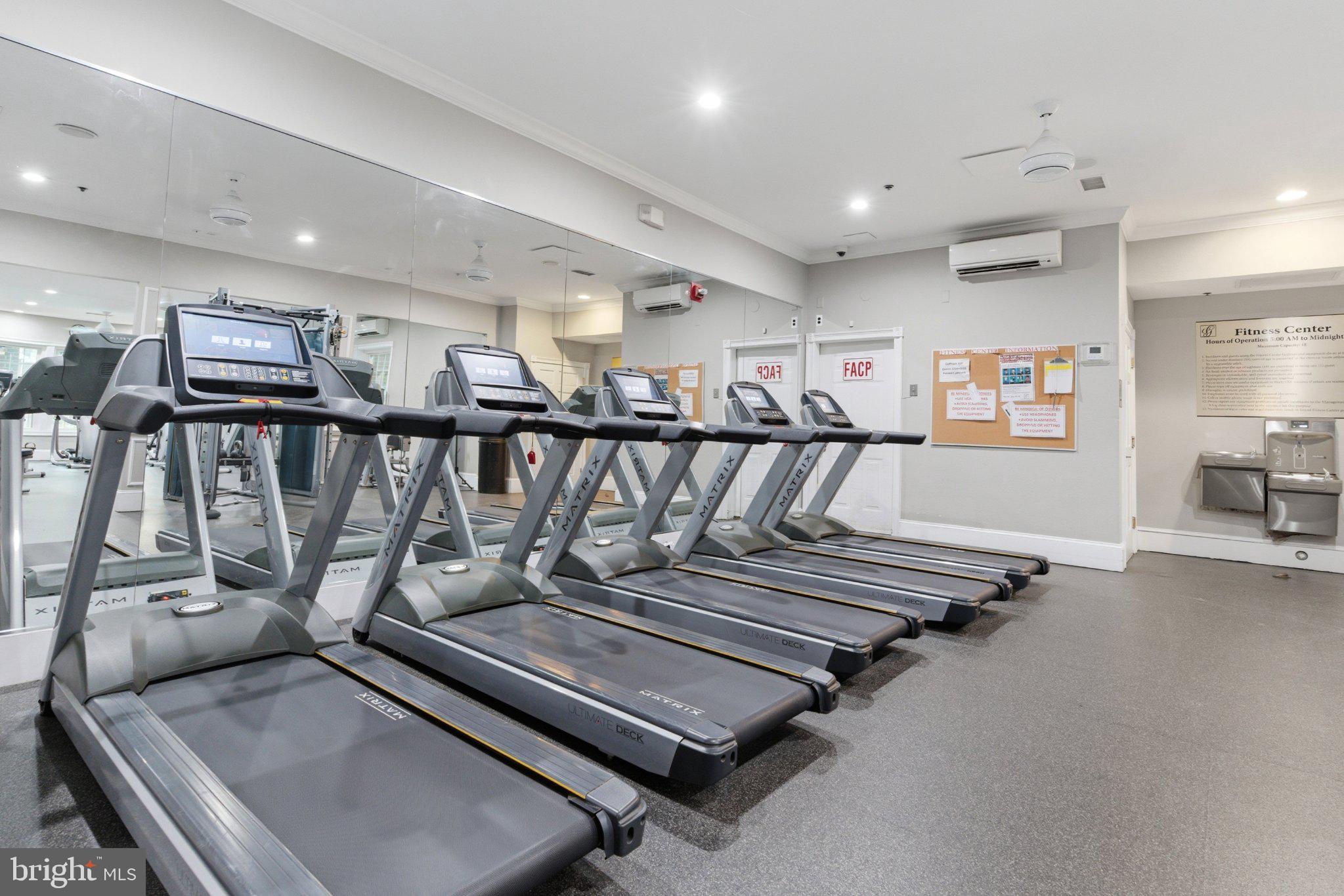 1580 Spring Gate Dr., Unit 4303 McLean, VA 22102 - Photo 28 of 41 Modern fitness center with treadmills.