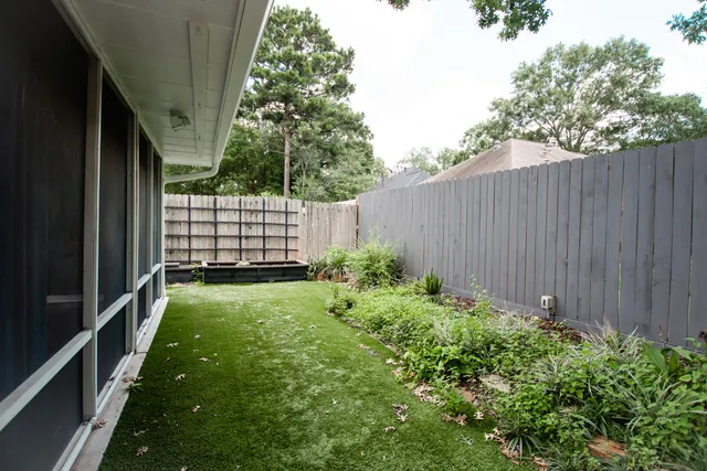 a backyard of a house with seating space