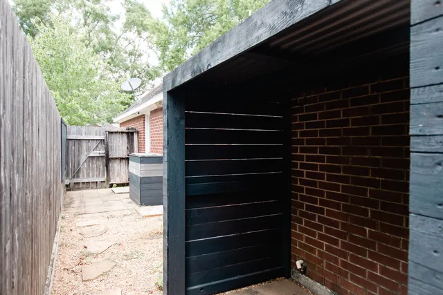a backyard of a house with lots of green space