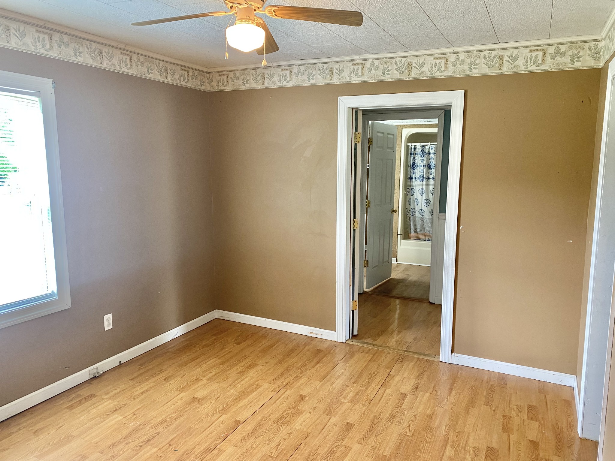 271 Hunt Street Manchester, TN 37355 - Photo 11 of 21 wooden floor in an empty room