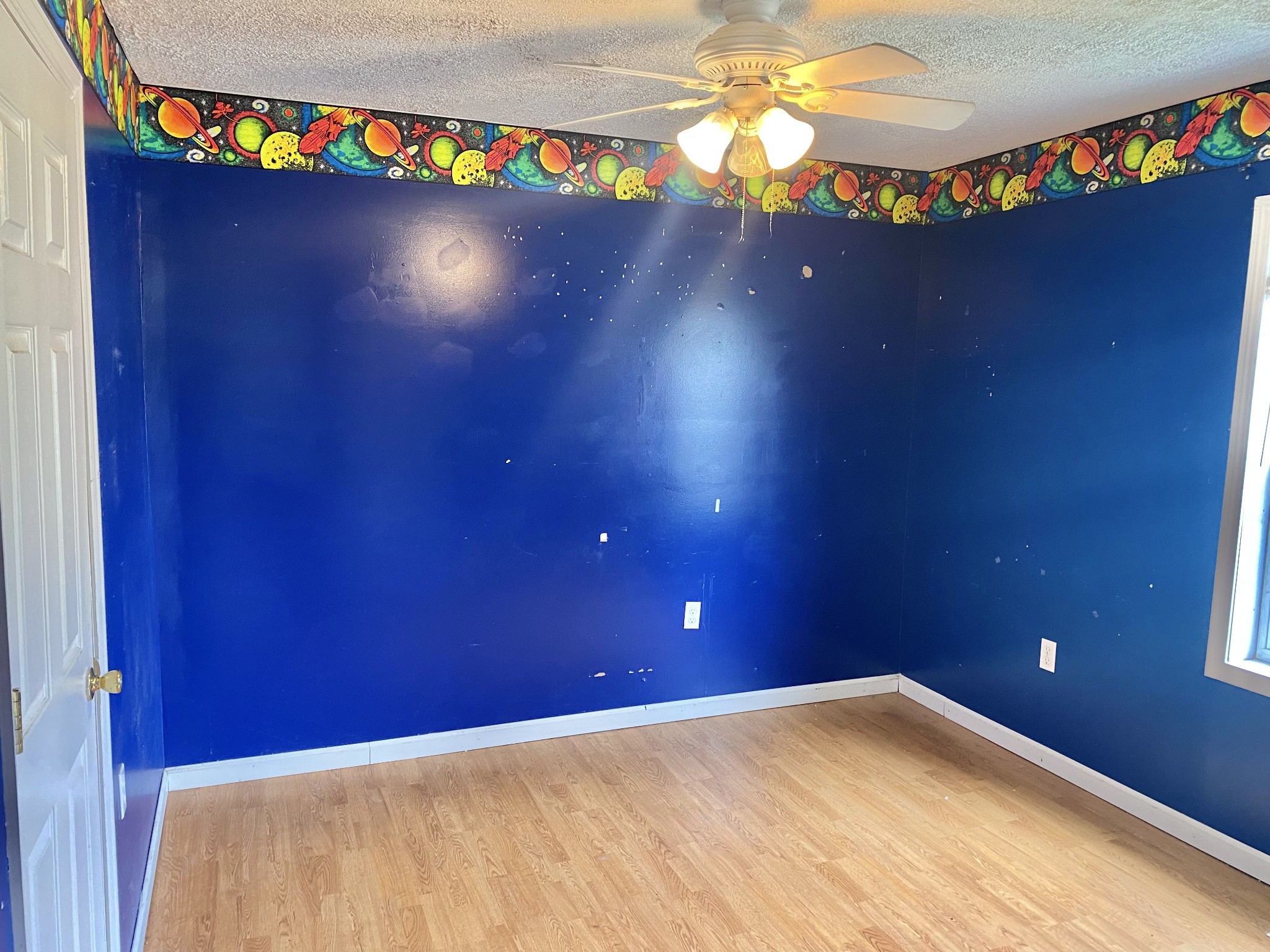 271 Hunt Street Manchester, TN 37355 - Photo 13 of 21 a view of an empty room and a ceiling fan