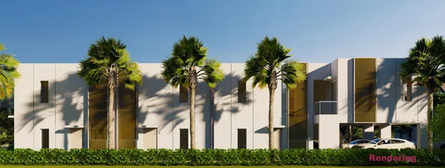 a view of a palm trees in front of a house