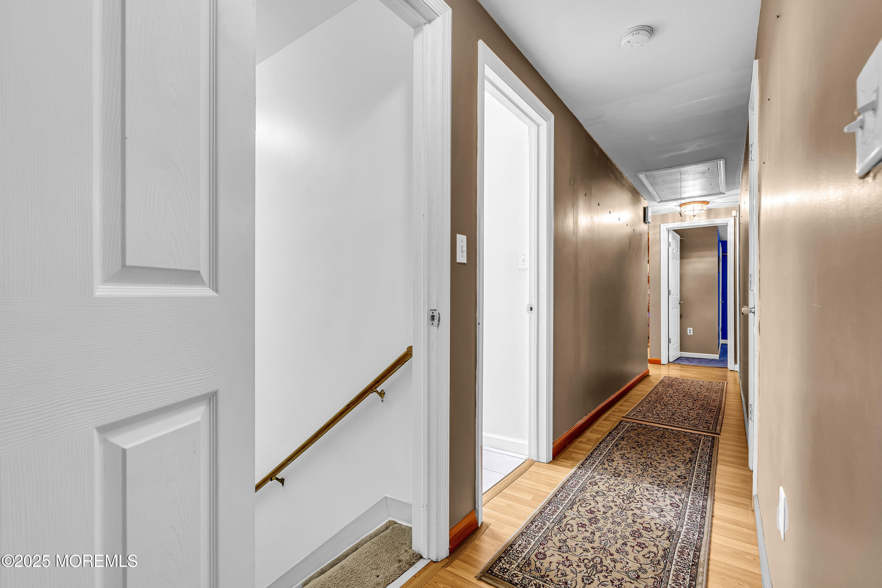 444 Cook Road Jackson, NJ 08527 - Photo 23 of 71 a view of hallway with wooden floor