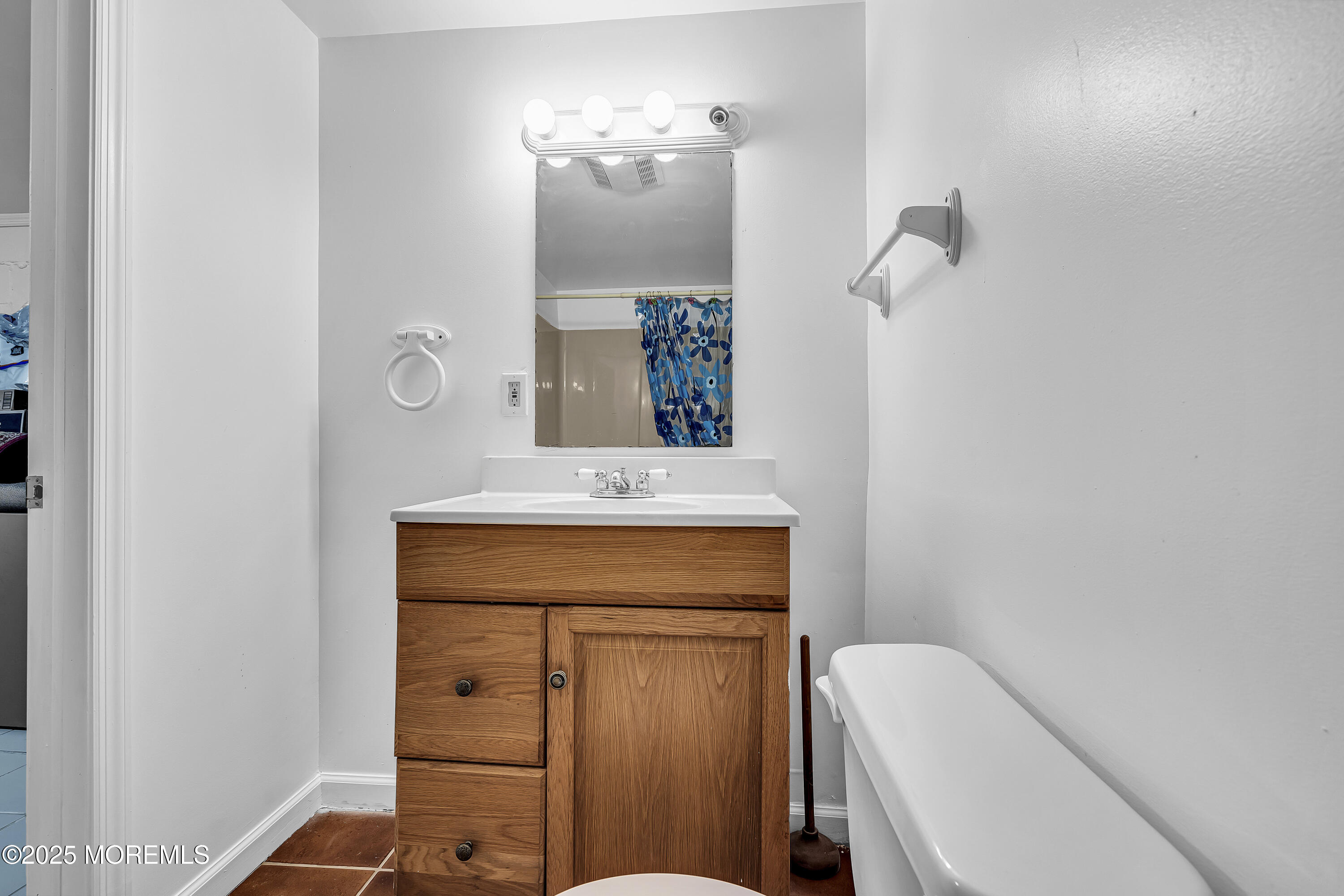 444 Cook Road Jackson, NJ 08527 - Photo 27 of 71 a bathroom with a sink a toilet and mirror
