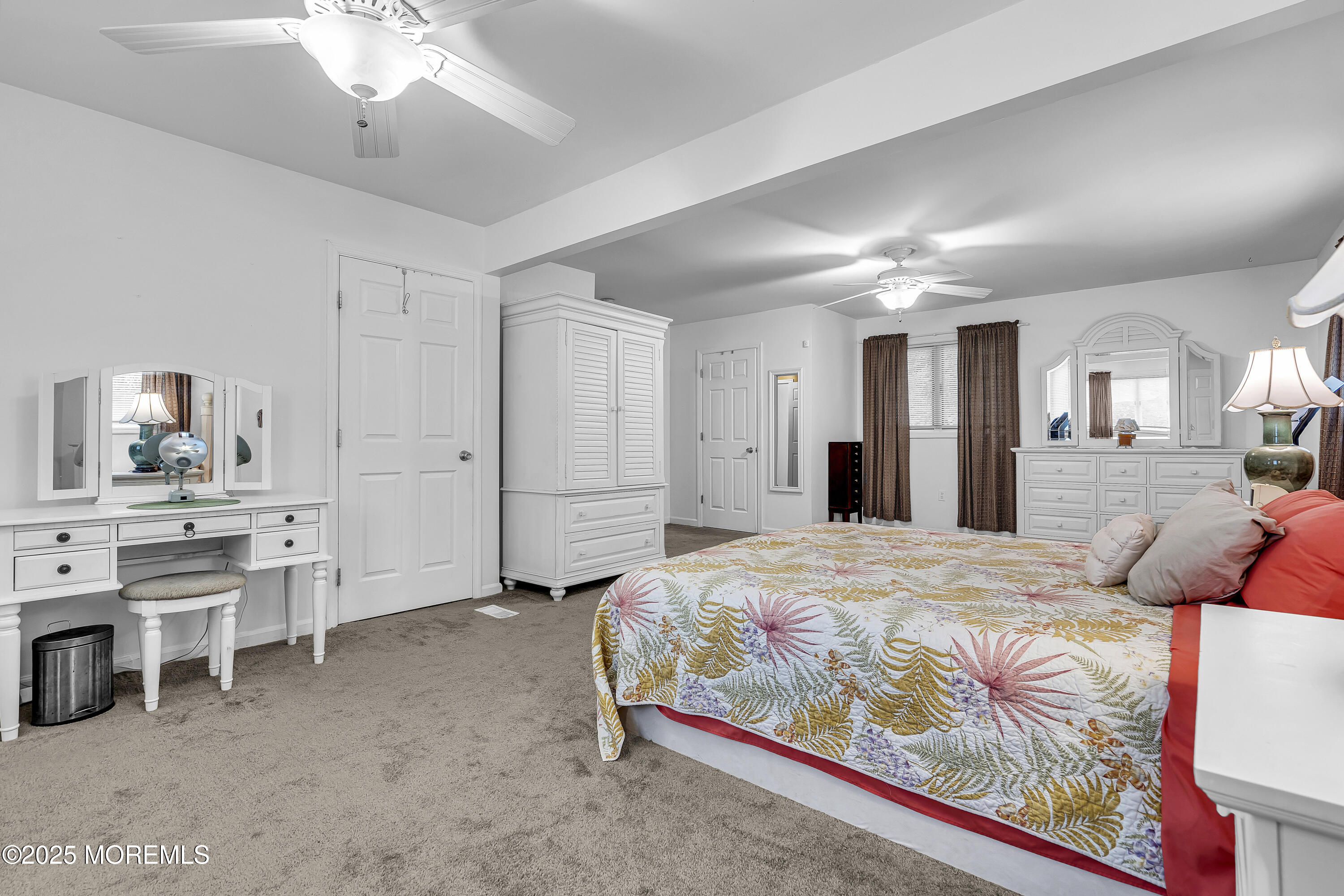 444 Cook Road Jackson, NJ 08527 - Photo 28 of 71 a bedroom with furniture and a mirror
