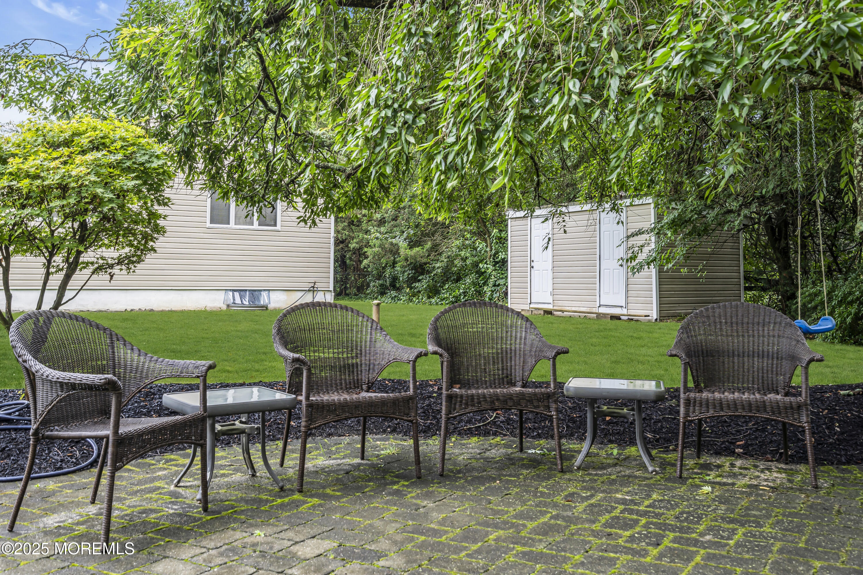 444 Cook Road Jackson, NJ 08527 - Photo 43 of 71 a view of a chairs and table in patio