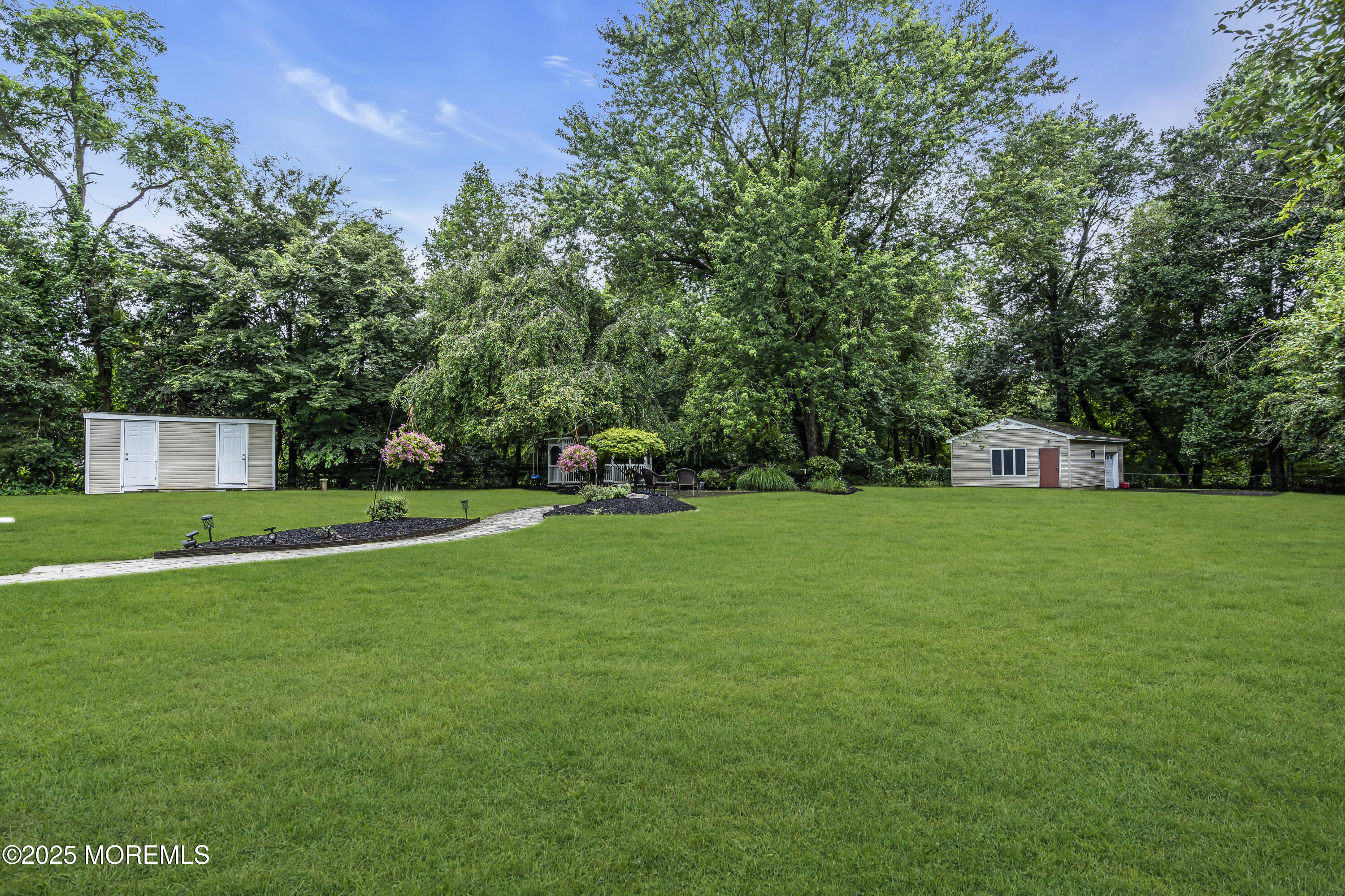 444 Cook Road Jackson, NJ 08527 - Photo 46 of 71 a front view of a house with a yard