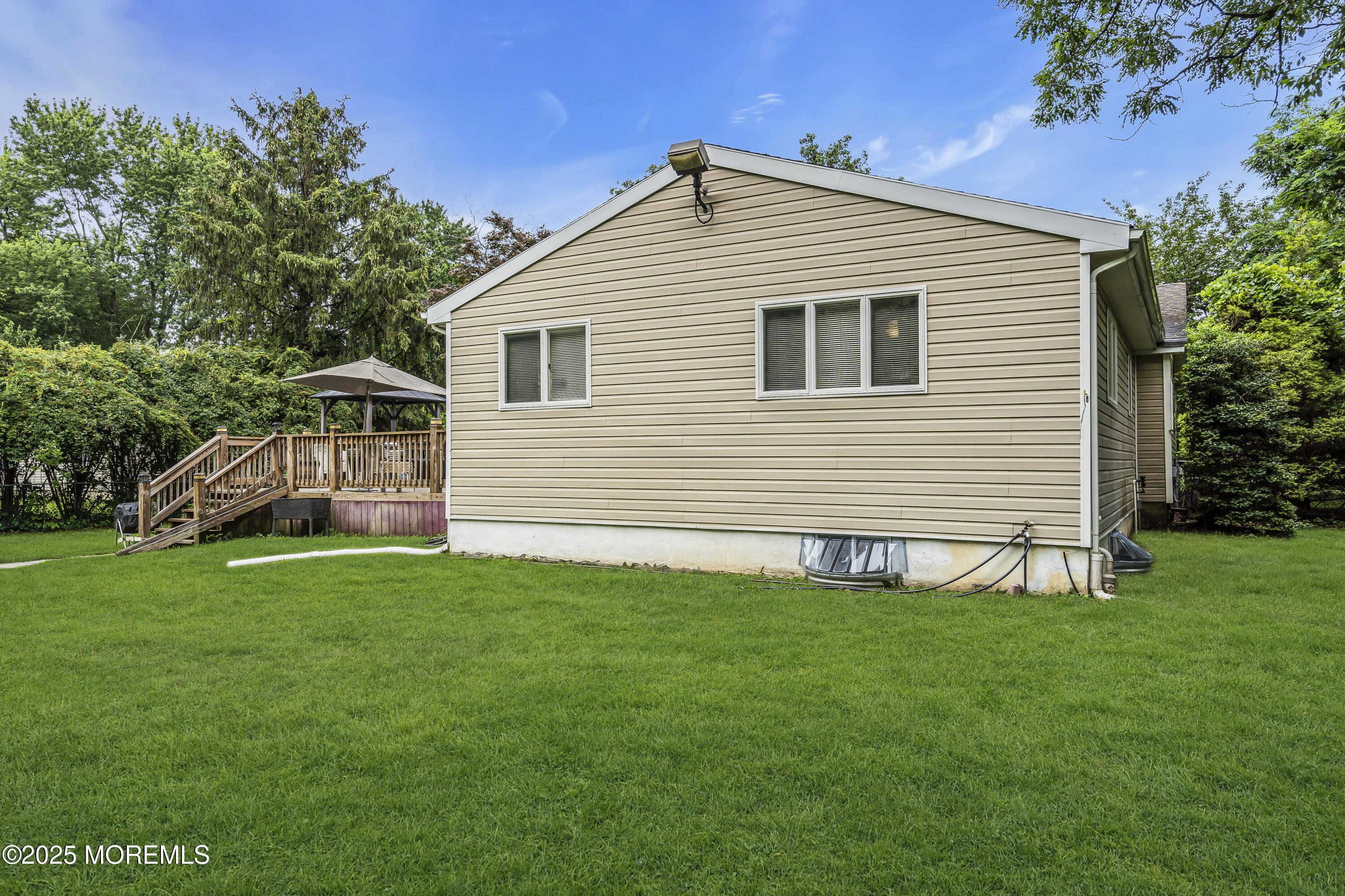 444 Cook Road Jackson, NJ 08527 - Photo 54 of 71 a front view of a house with a garden