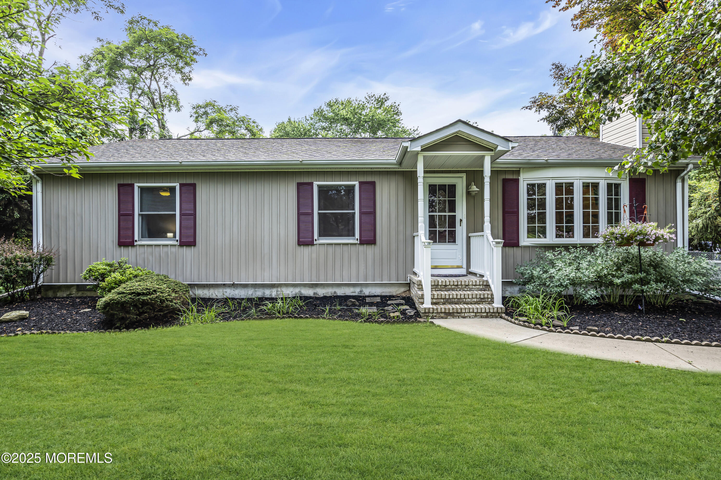 444 Cook Road Jackson, NJ 08527 - Photo 61 of 71 a front view of a house with a garden