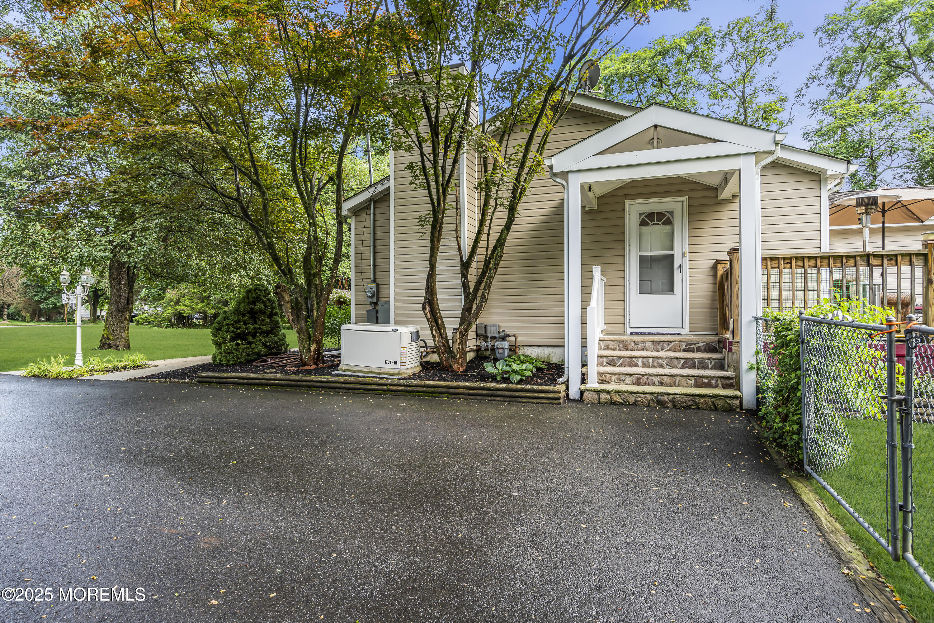 444 Cook Road Jackson, NJ 08527 - Photo 70 of 71 front view of a house with a street