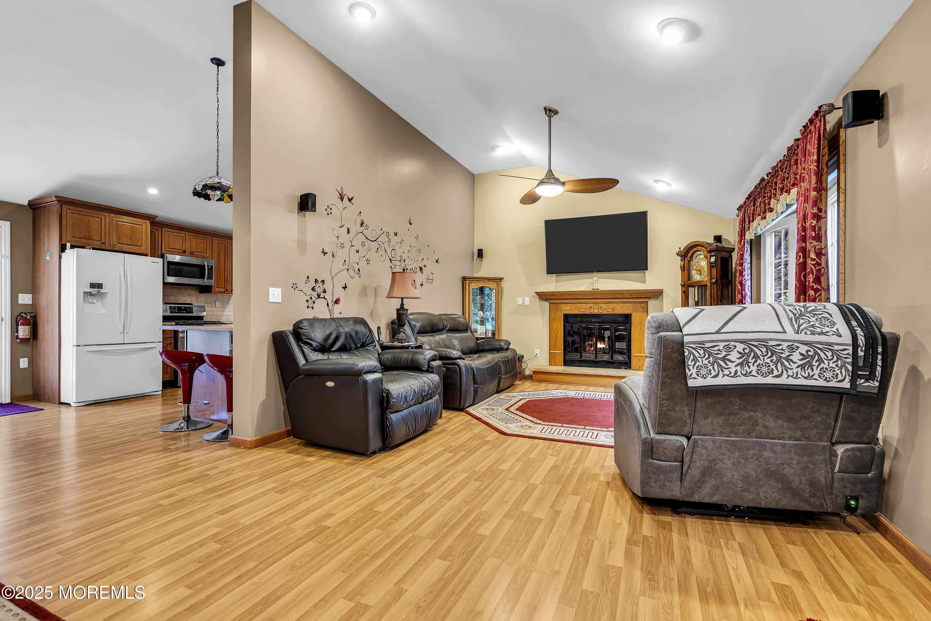 444 Cook Road Jackson, NJ 08527 - Photo 7 of 71 a living room with furniture and a fireplace