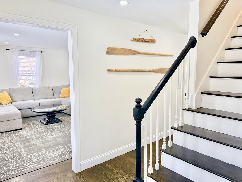 117 A P Newcomb Road Brewster, MA 02631 - Photo 12 of 42 a living room with furniture and a rug