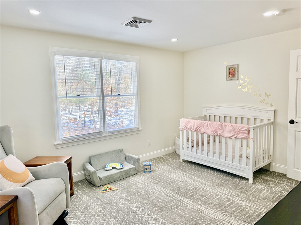 117 A P Newcomb Road Brewster, MA 02631 - Photo 23 of 42 a bedroom with furniture and a window