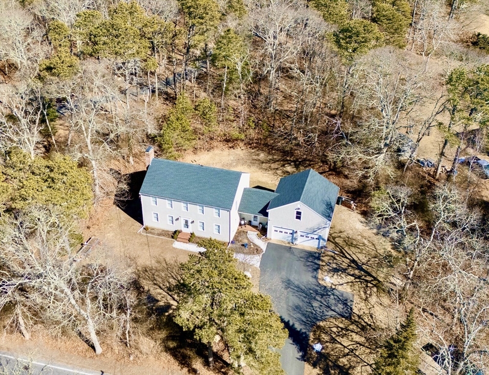 117 A P Newcomb Road Brewster, MA 02631 - Photo 5 of 42 an aerial view of residential houses with outdoor space