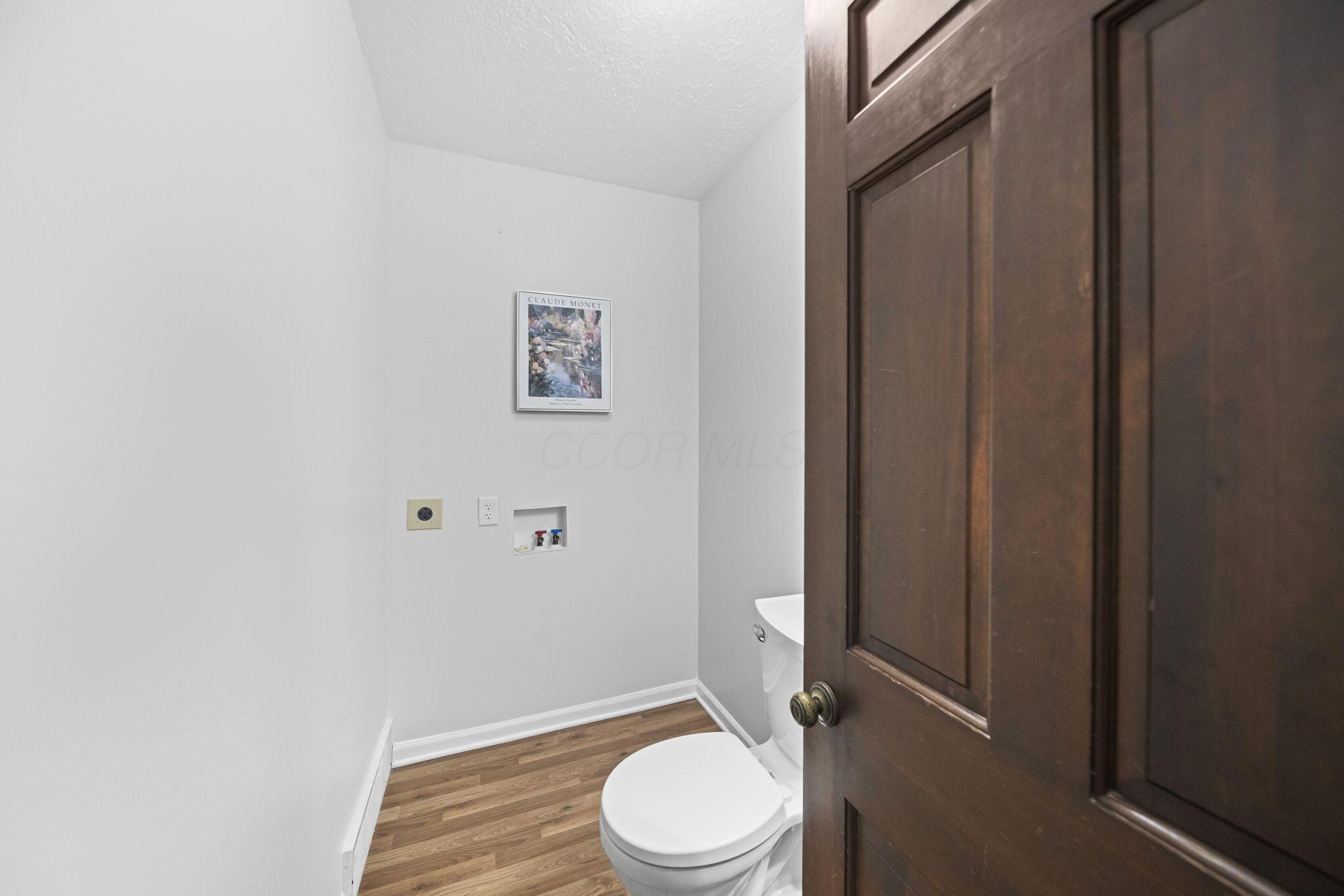 2690 Boving Road Southwest Lancaster, OH 43130 - Photo 26 of 86 Hall Half Bath and First Floor Laundry