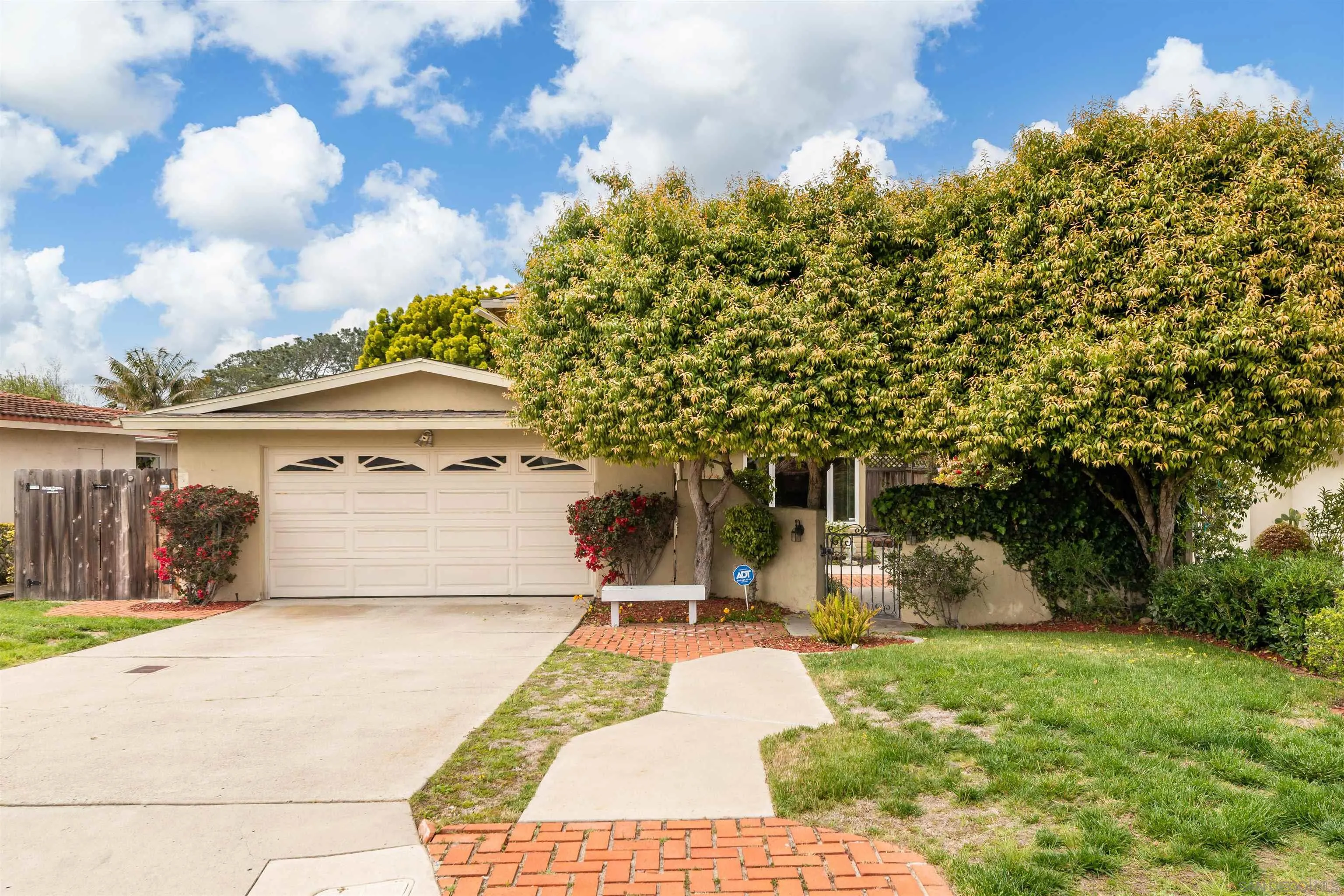 a view of a street with a building in the background