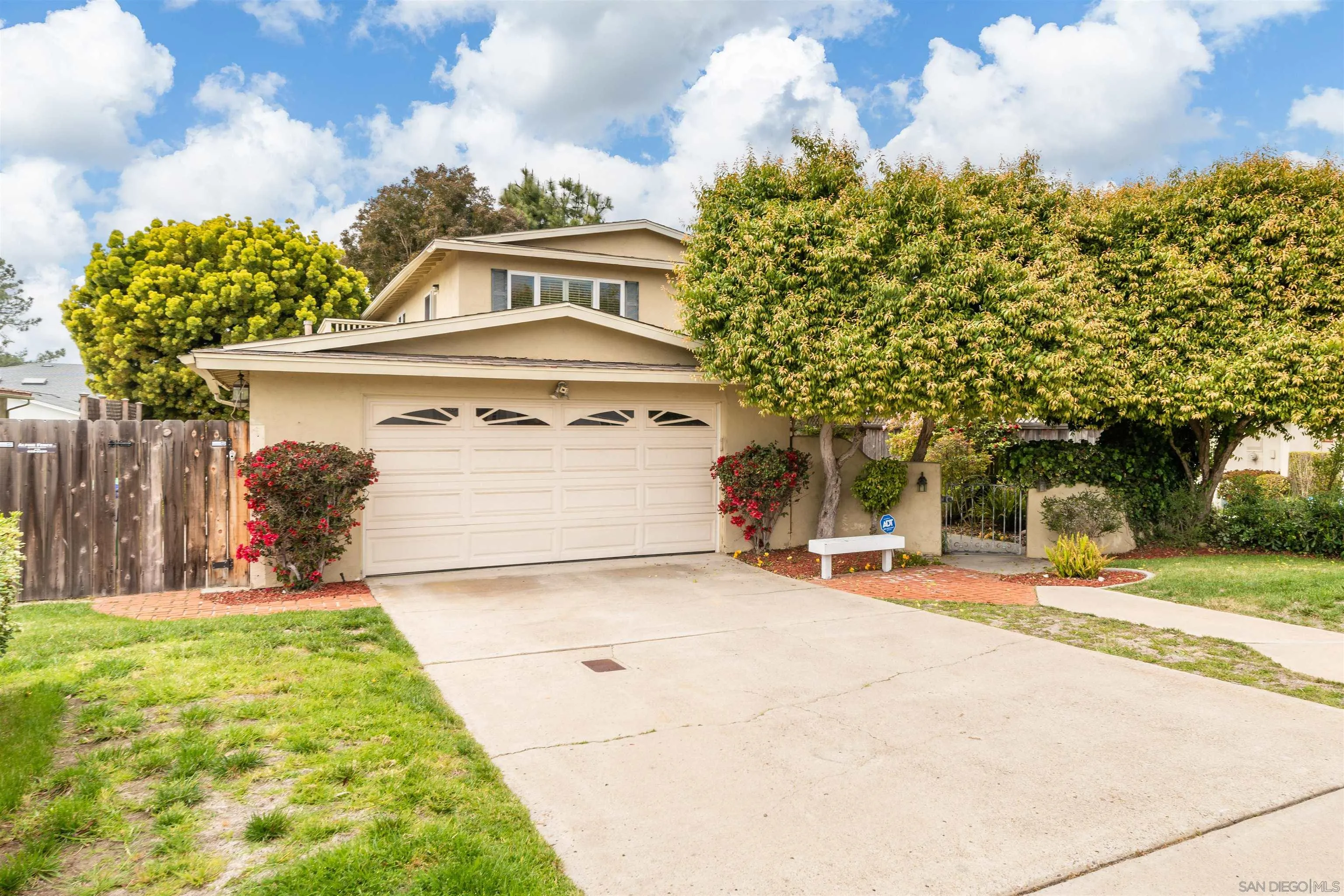 13766 Durango Drive Del Mar, CA 92014 - Photo 2 of 30 a front view of a house with a garden