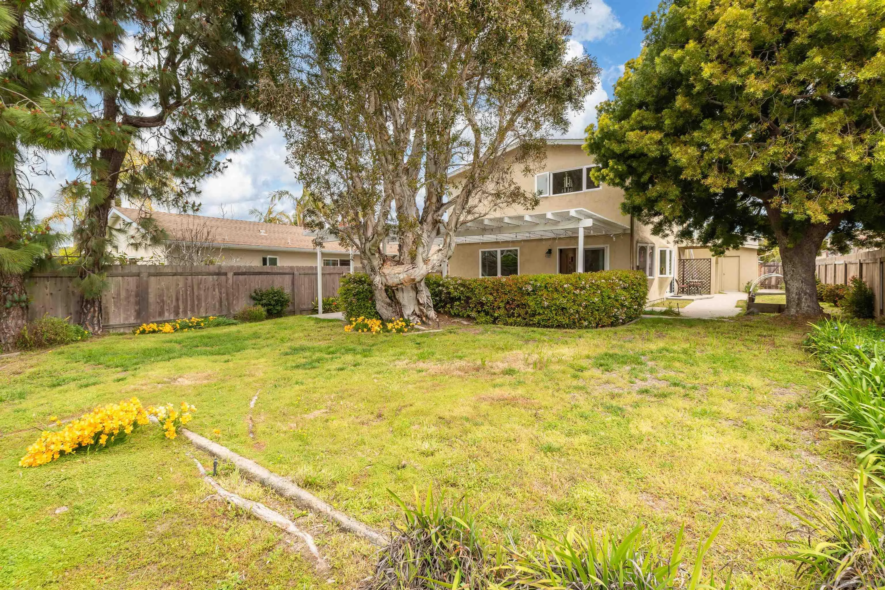 13766 Durango Drive Del Mar, CA 92014 - Photo 22 of 30 a view of house with a yard