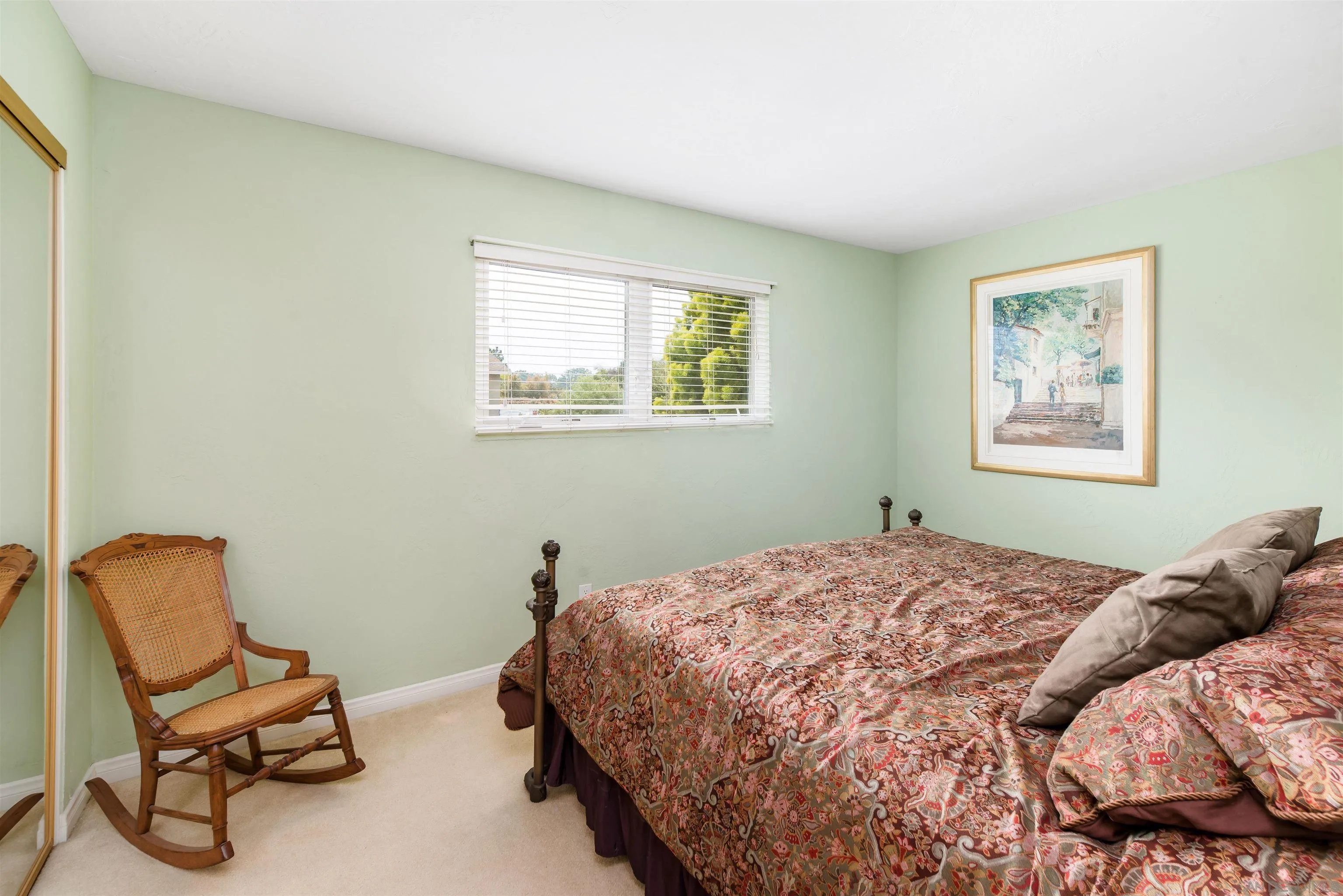 13766 Durango Drive Del Mar, CA 92014 - Photo 28 of 30 a bedroom with a bed chair and window