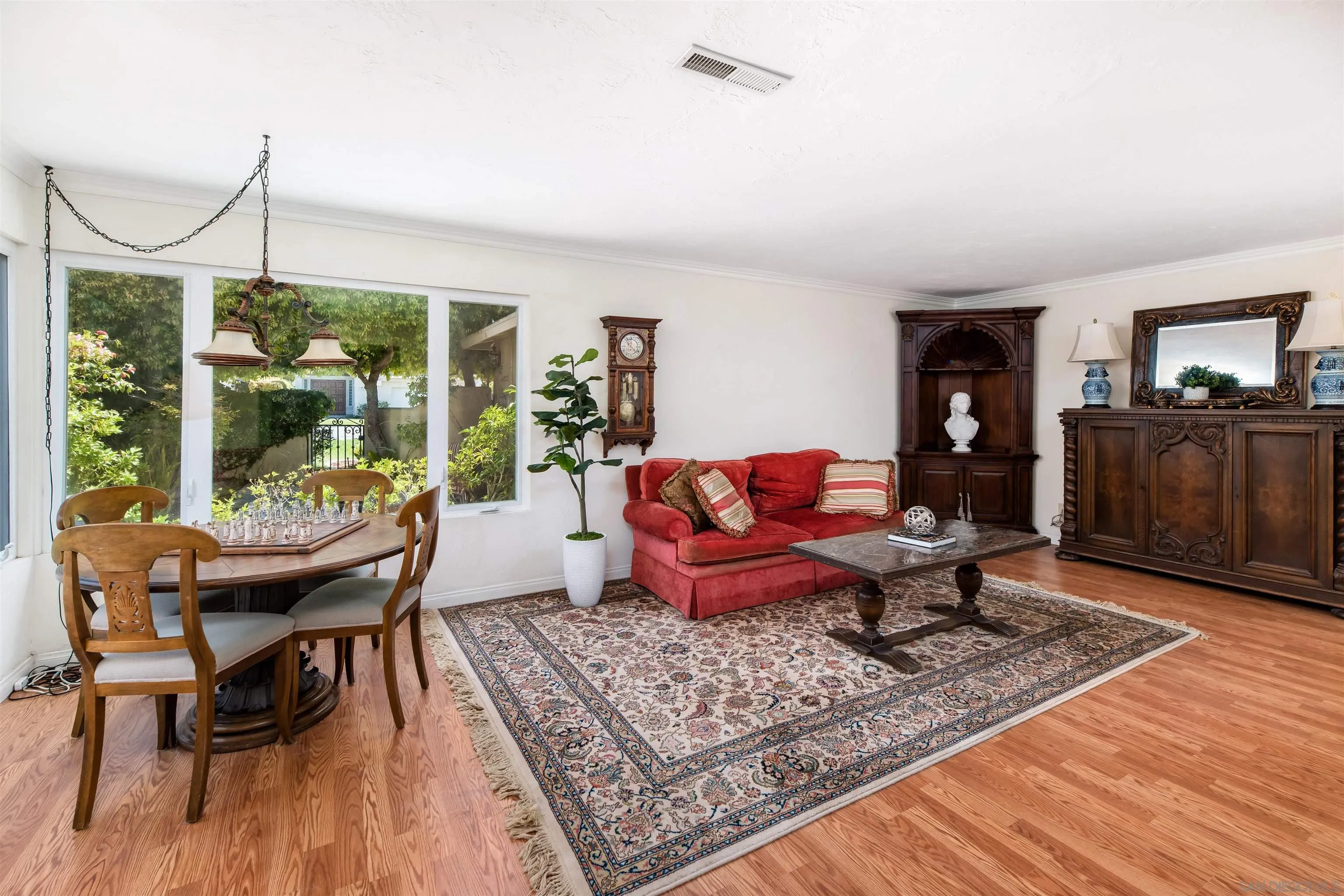 13766 Durango Drive Del Mar, CA 92014 - Photo 5 of 30 a living room with furniture and a wooden floor