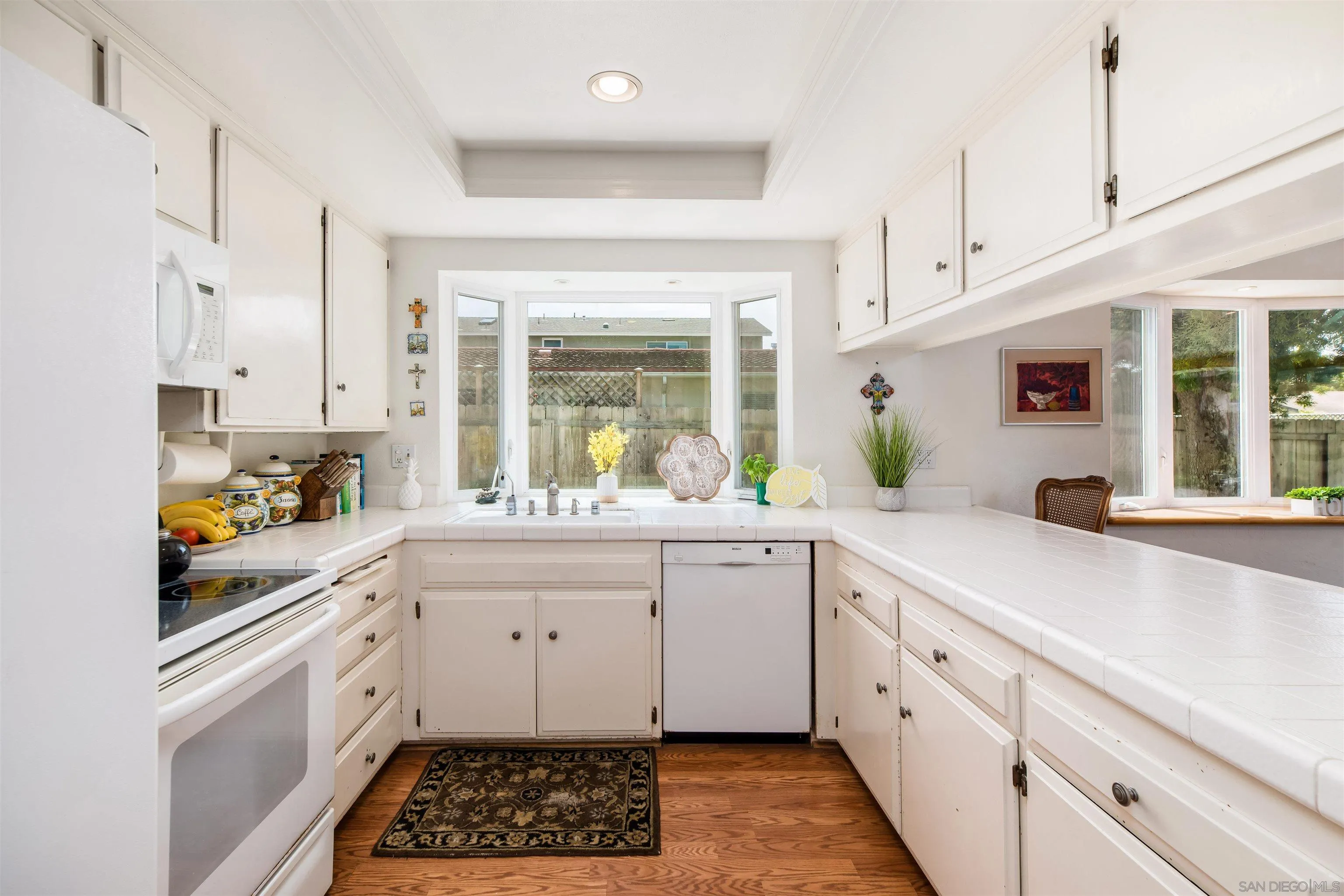 13766 Durango Drive Del Mar, CA 92014 - Photo 8 of 30 a kitchen with granite countertop a sink stainless steel appliances and cabinets