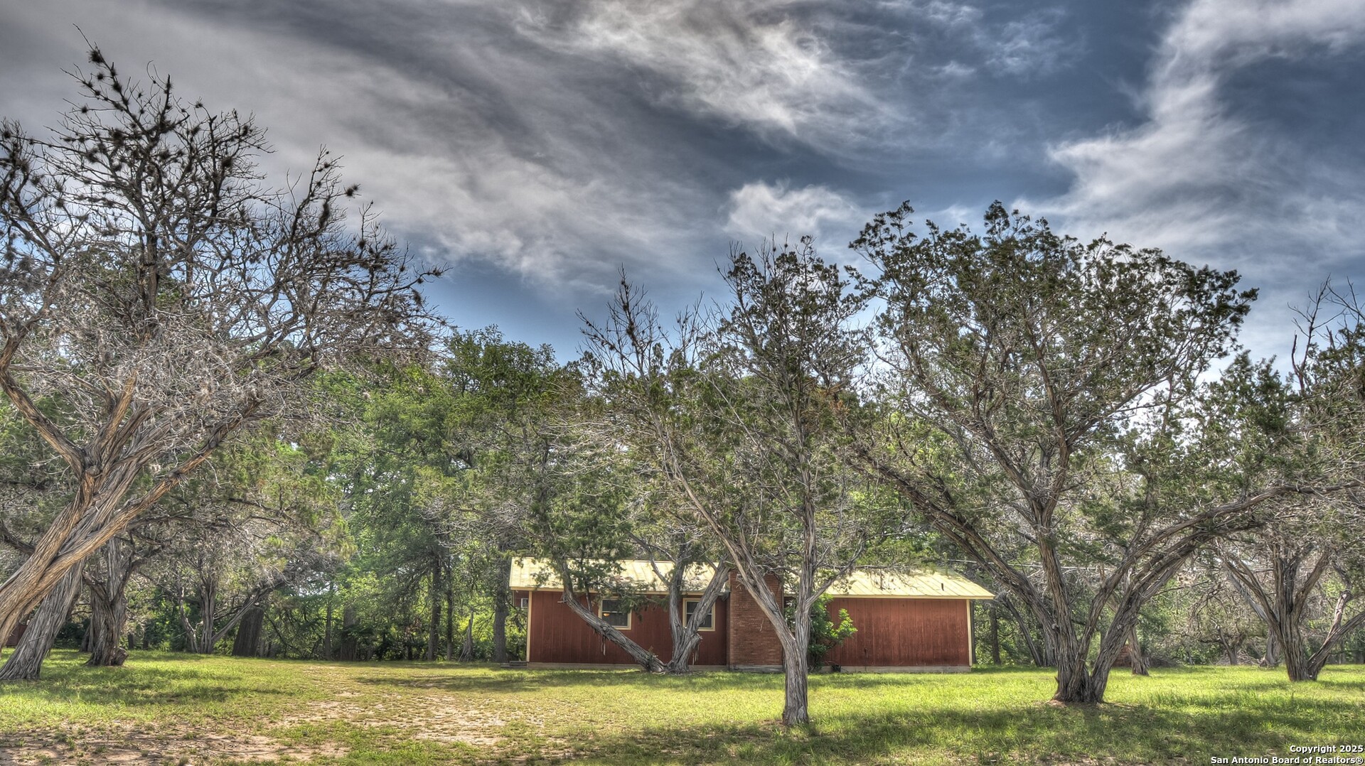 154 Weston Road Leakey, TX 78873 - Photo 37 of 39 a view of a yard with large trees