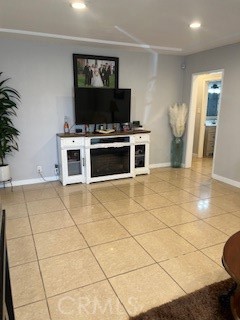 9917 Van Ruiten Street Bellflower, CA 90706 - Photo 3 of 23 a view of a livingroom with furniture and flat screen tv