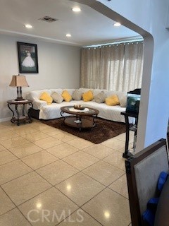 9917 Van Ruiten Street Bellflower, CA 90706 - Photo 4 of 23 a living room with furniture and a large window