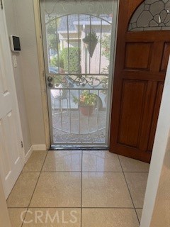 9917 Van Ruiten Street Bellflower, CA 90706 - Photo 5 of 23 a view of a refrigerator in a kitchen