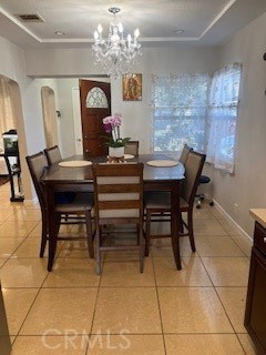 9917 Van Ruiten Street Bellflower, CA 90706 - Photo 9 of 23 a view of a dining room with furniture