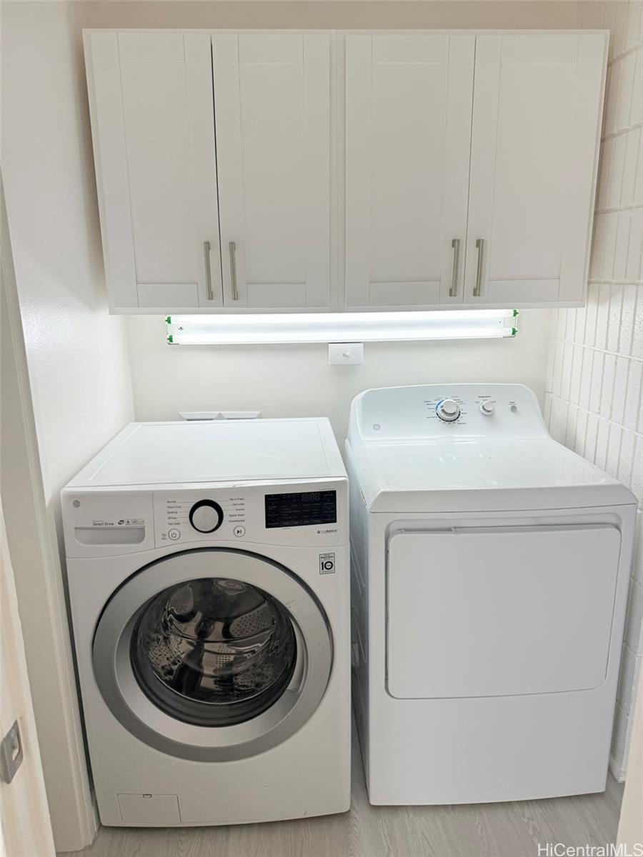 3215 Ala Ilima Street, Unit A1202 Honolulu, HI 96818 - Photo 5 of 20 a utility room with dryer and washer