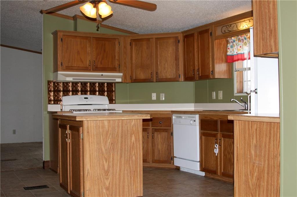 160 West County Line Road Jamestown, PA 16134 - Photo 11 of 18 Kitchen view from the side entry approach