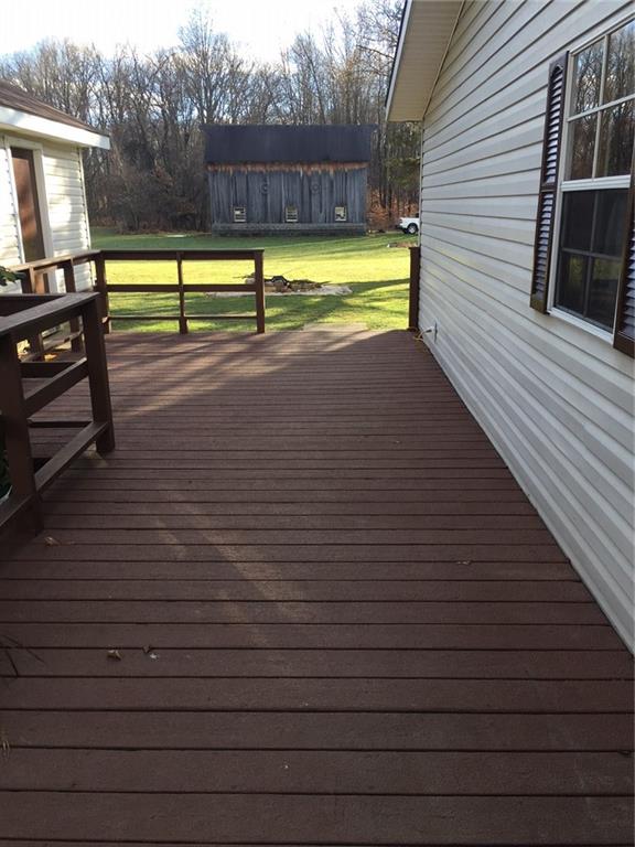 160 West County Line Road Jamestown, PA 16134 - Photo 5 of 18 Side Entry Deck with a view of the workshop and Barn