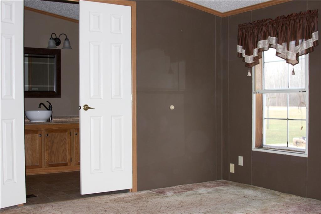 160 West County Line Road Jamestown, PA 16134 - Photo 8 of 18 Master bedroom with the entry to the remodeled Master Bath