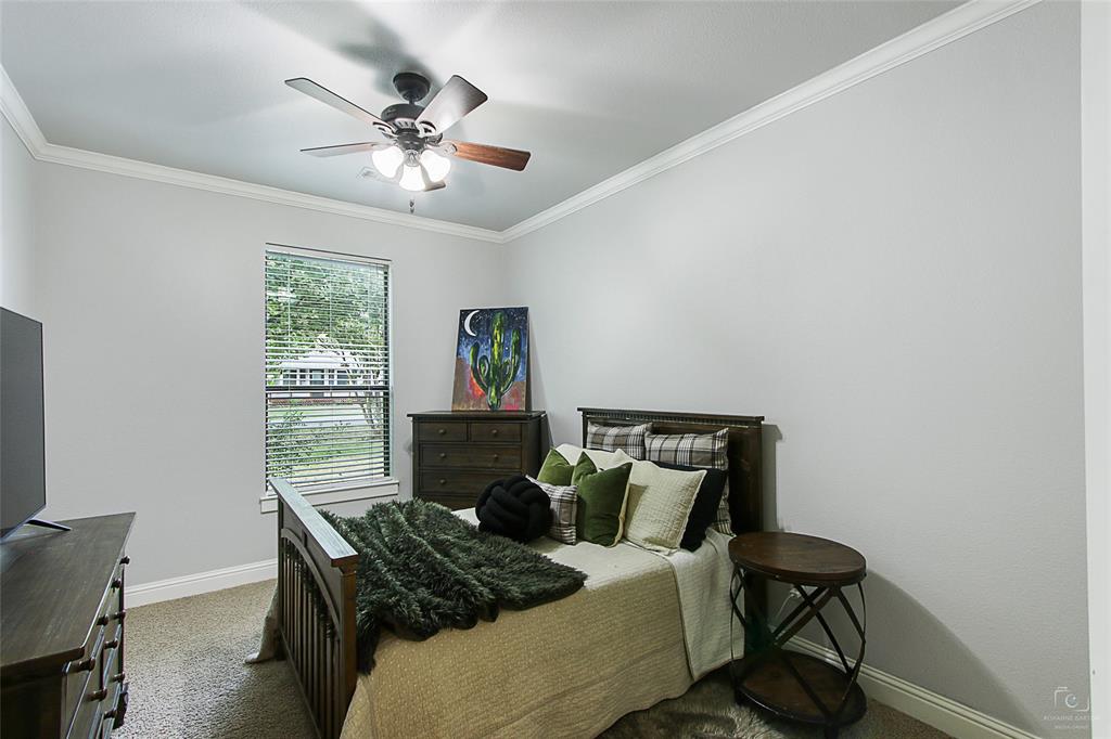 263 West Jefferson Street Van Alstyne, TX 75495 - Photo 17 of 32 a view of a workspace with furniture and a window