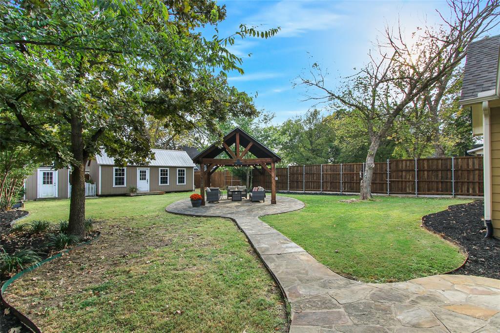 263 West Jefferson Street Van Alstyne, TX 75495 - Photo 26 of 32 a view of a house with backyard