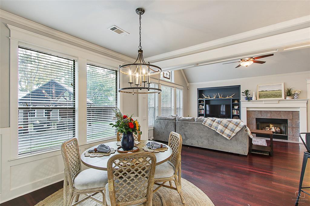 263 West Jefferson Street Van Alstyne, TX 75495 - Photo 9 of 32 a view of a livingroom with furniture window and wooden floor