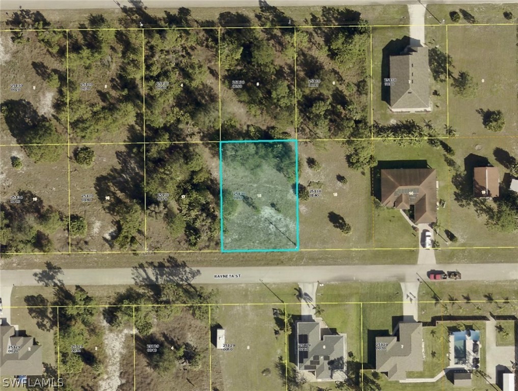 441 Rayneta Street Lehigh Acres, FL 33974 - Photo 1 of 5 an aerial view of a house with a yard
