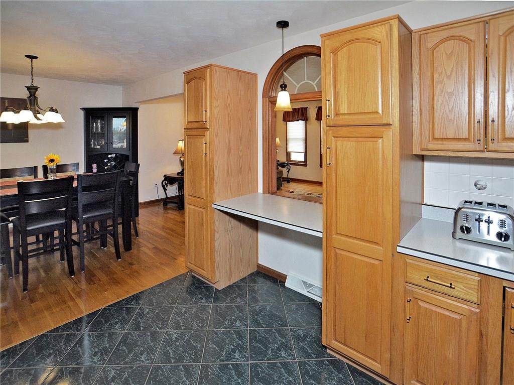 77 Rustic Ridge Drive Pittsburgh, PA 15239 - Photo 4 of 25 Two pantries with desktop inbetween or extra counter space.