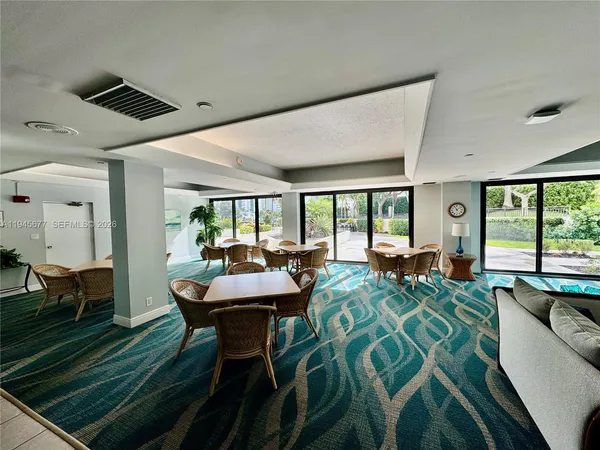 a view of a backyard of the house