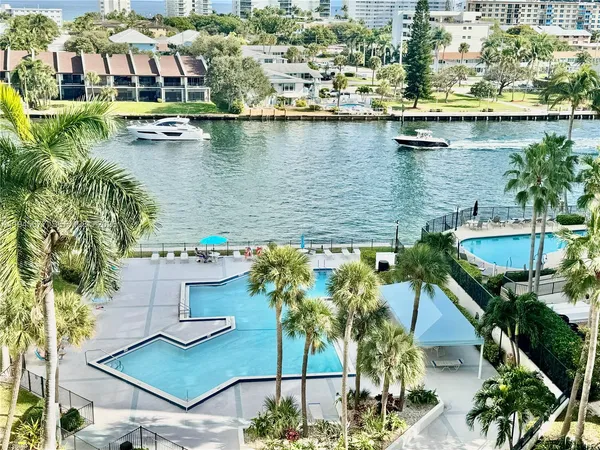 an aerial view of house with a lake view