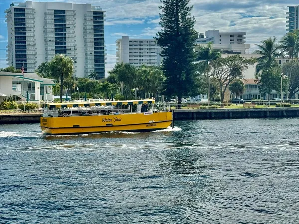 a front view of a building with garden